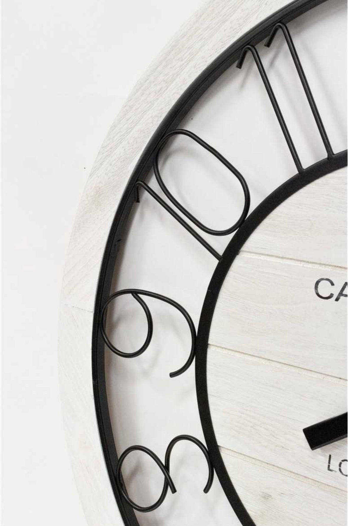 White & Black Iron Clock